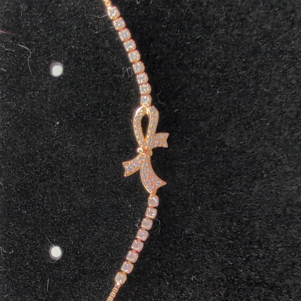 New Elegant Yellow Gold Bow Bracelet with Cubic Zirconias